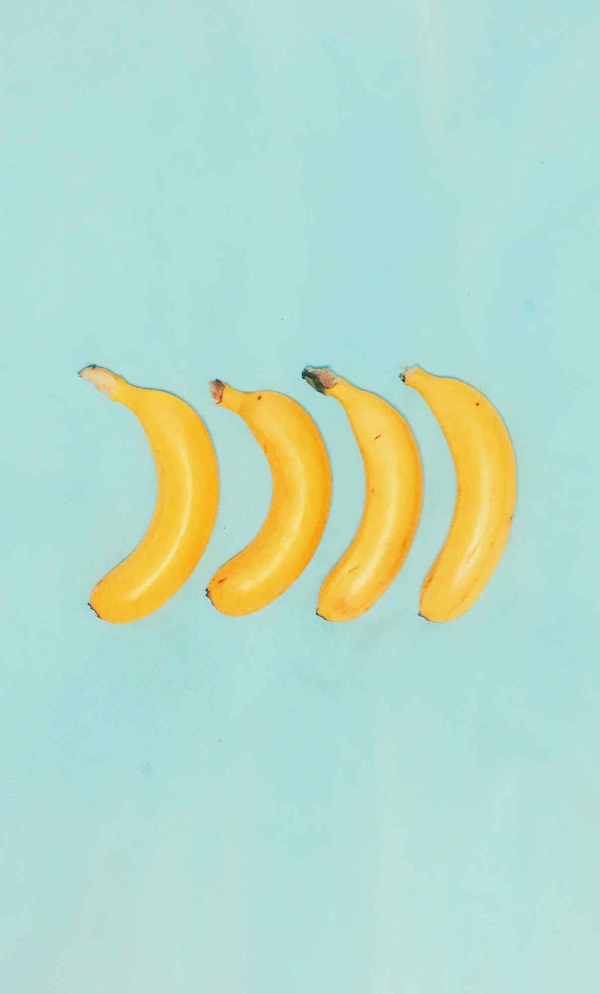 四只香蕉排排列图片简约手机壁纸
