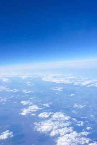机窗外的蓝天白云手机壁纸