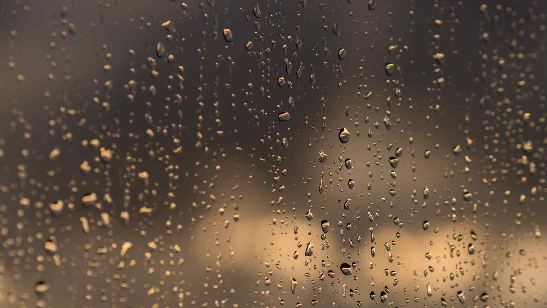 窗户上滑落的雨滴唯美图片桌面壁纸