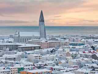 冰岛首都雷克雅未克唯美日出雪景图桌面壁纸