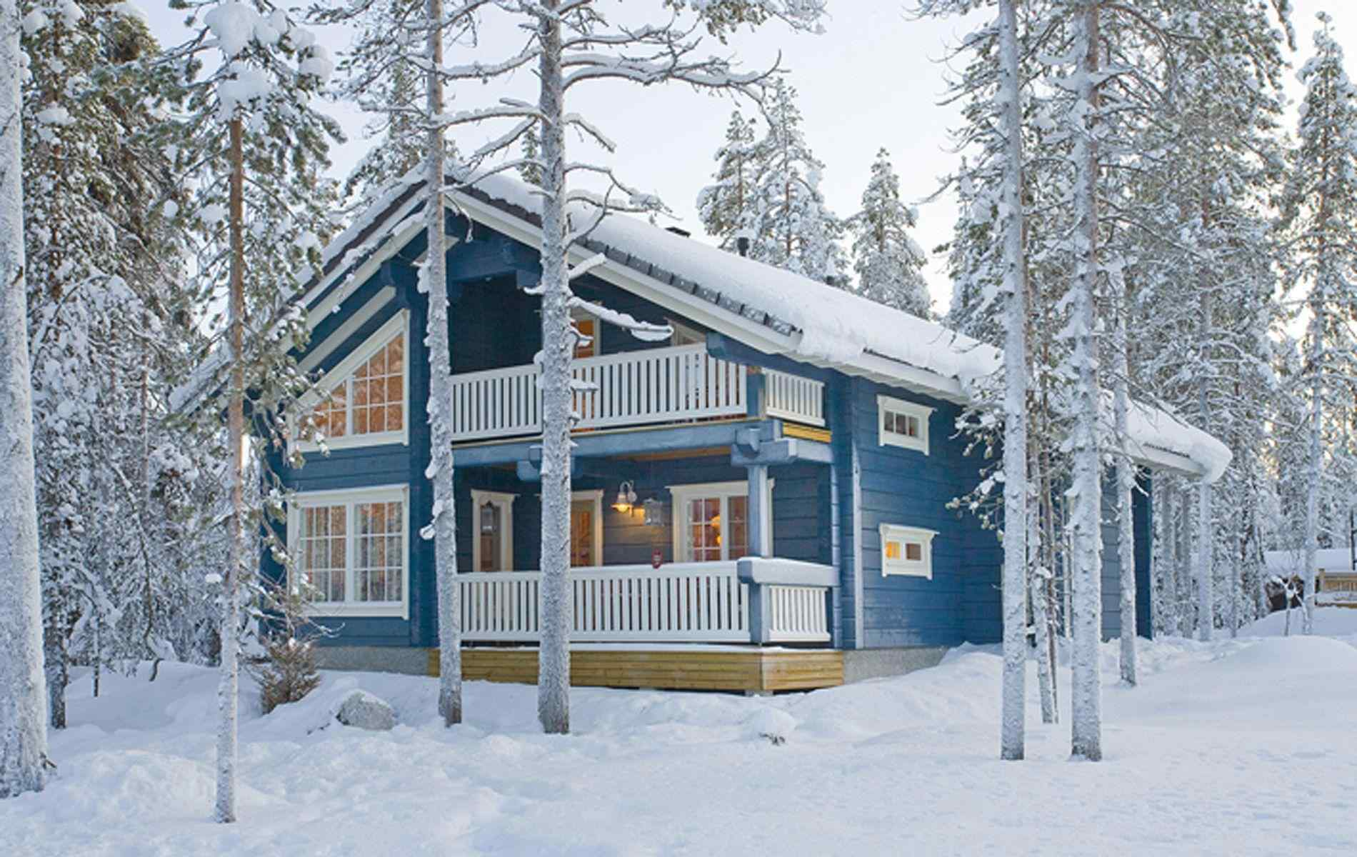 芬兰林中小屋浪漫雪景桌面壁纸