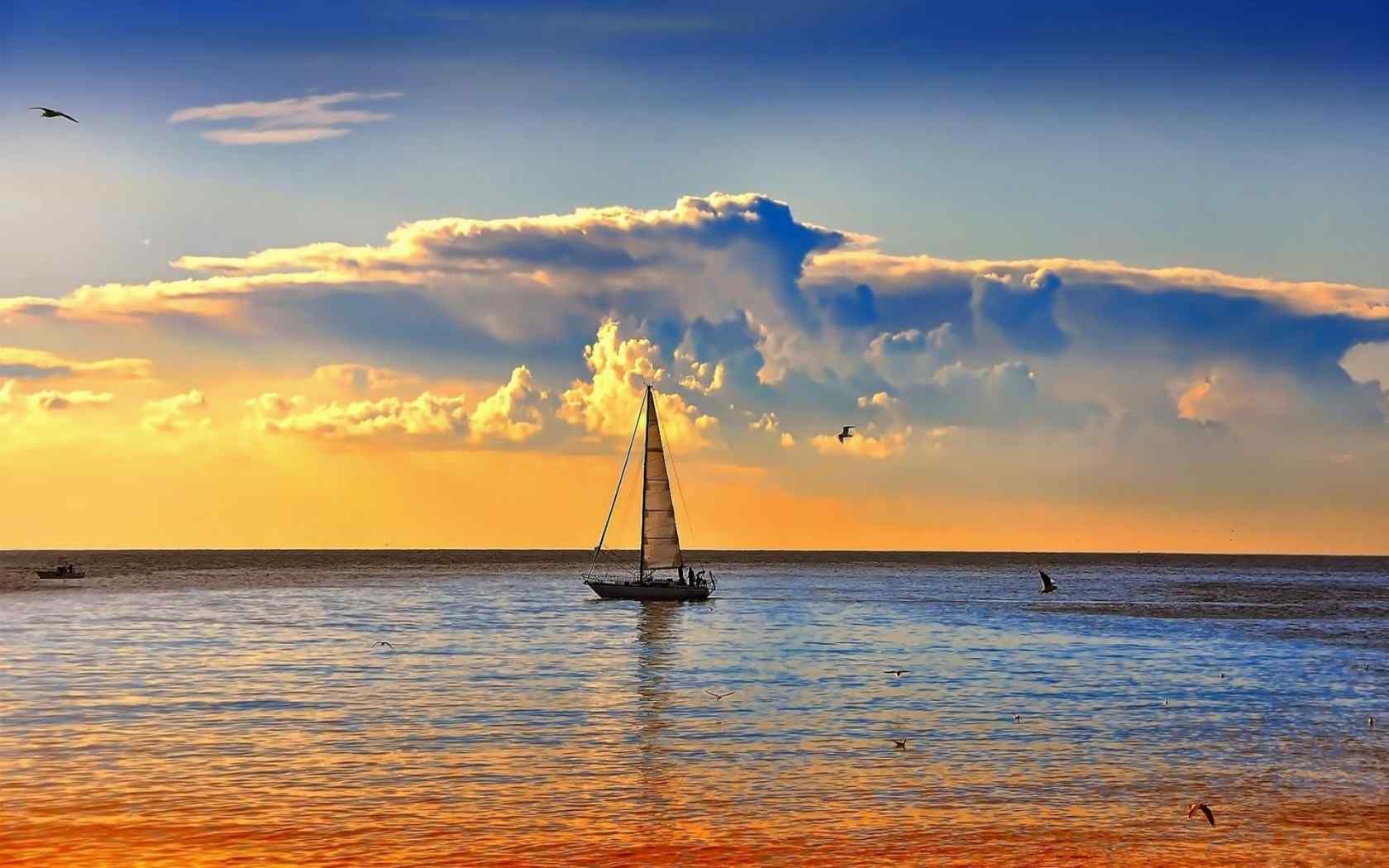 海面上的帆船唯美夕阳风景图片电脑桌面壁纸