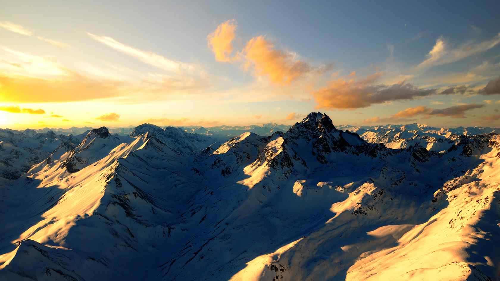 雪山上唯美的日出风景图片