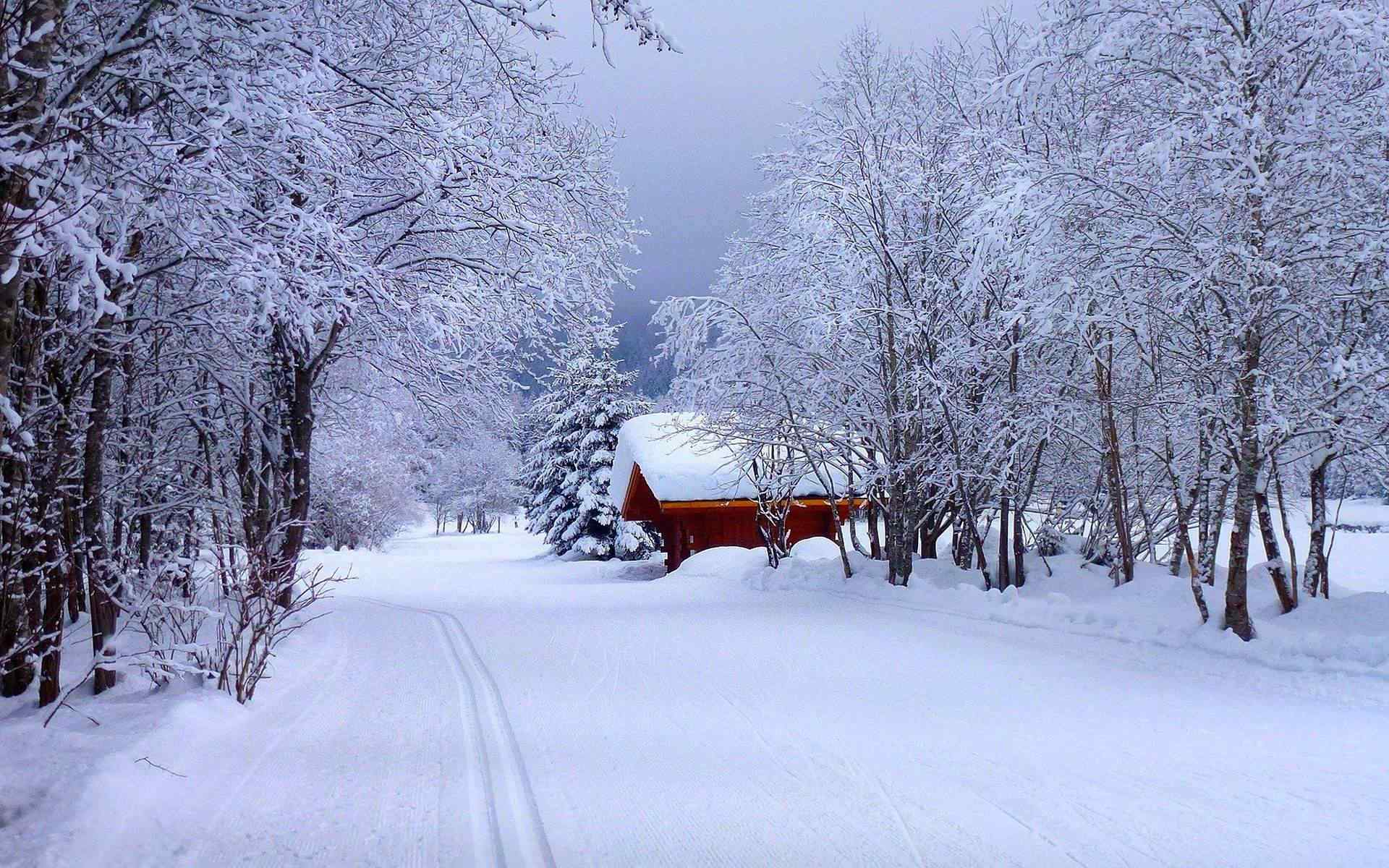  唯美雪景中小木屋风景壁纸